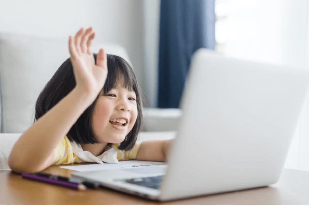 Student listening carefully during Chinese audio lesson