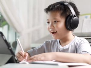 Boy learning through tablet